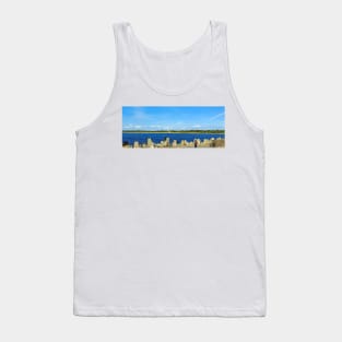 People fishing with a line on an old stone pier on a clear day Tank Top